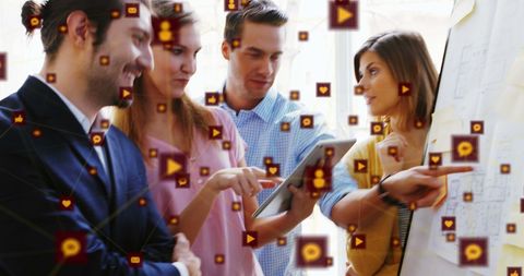 Business Team Exploring Digital Network Concept in Modern Office