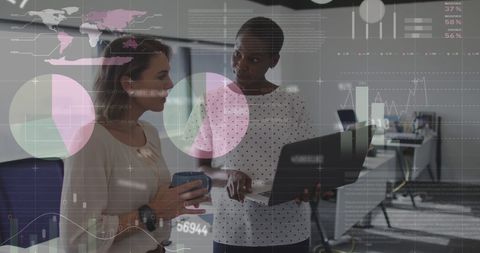 Diverse Business Professionals Analyzing Data with Laptop in Modern Office