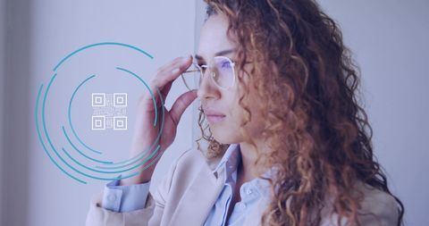 Businesswoman Using Augmented Reality with QR Code