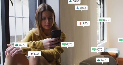 Young Woman Engaging in Social Media at Home with Digital Interactions