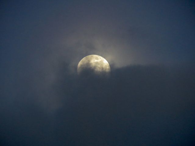 Full Moon Partially Covered by Dark Clouds at Night - Download Free Stock Photos Pikwizard.com