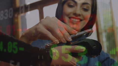 Woman Using Smartphone for Contactless Payment