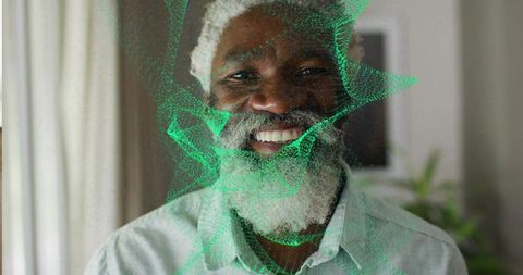 Senior man portrait with digital mesh overlay in living room