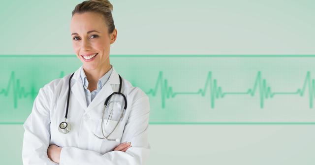 This image depicts a smiling female doctor wearing a white coat and stethoscope, standing with her arms crossed. The medical waveform background suggests a healthcare environment, suitable for medical or hospital-related content. Perfect for use in healthcare promotion, medical websites, hospital brochures, patient care flyers, or health service advertisements.
