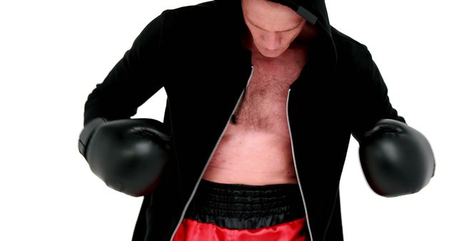 Boxer Preparing for Match Wearing Gloves and Hooded Jacket - Download Free Stock Images Pikwizard.com