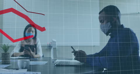 Diverse Business Colleagues Analyzing Financial Data in Office with Masks