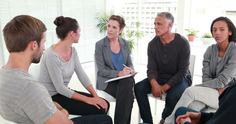 Therapy Session with Diverse Adult Group and Professional Facilitator - Download Free Stock Images Pikwizard.com