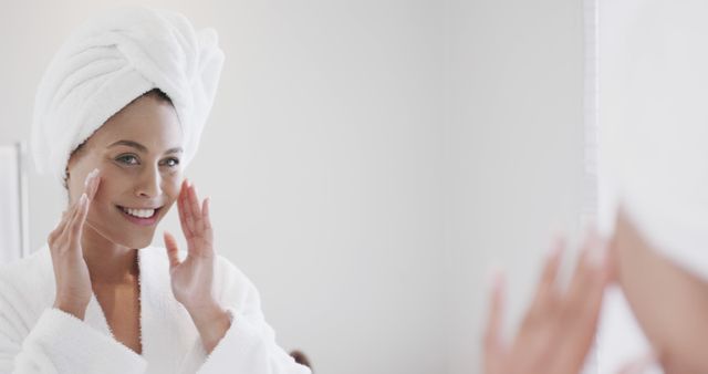 Woman Applying Skincare Products in Bathroom Mirror - Download Free Stock Images Pikwizard.com