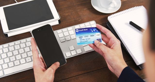 Caucasian businesswoman with credit card using smartphone to pay with copy space. Online shopping, business, finance and technology concept, unaltered.