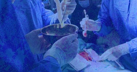 surgeons collaborating in operating room with bright lighting - Download Free Stock Images Pikwizard.com