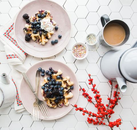 Creative Breakfast Scene with Waffles and Fresh Berries