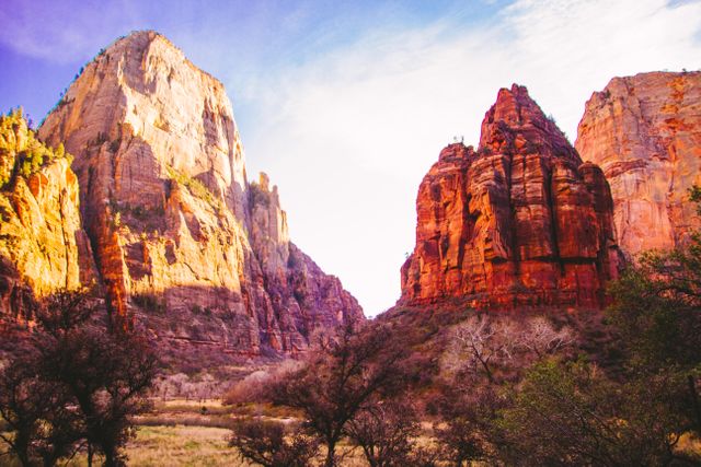 This captures the breathtaking majesty of Zion National Park with striking red rock formations and cliffs, perfect for travel blogs, outdoor adventure websites, nature magazines, and promotional materials for hiking and national parks.