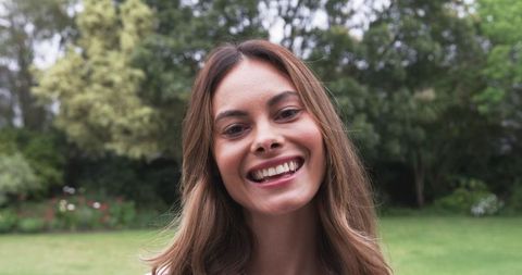 Joyful Woman Enjoying Public Park in Serenity