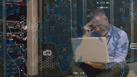 Businessman Analyzing Global Data Networks in Server Room