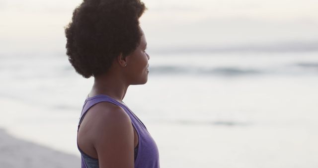 Woman Meditating by Ocean at Sunset - Download Free Stock Images Pikwizard.com