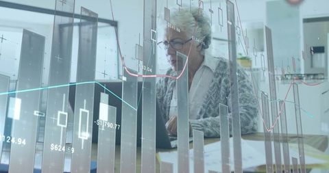 Senior Woman Analyzing Personal Finances on Laptop with Overlaid Stock Market Charts