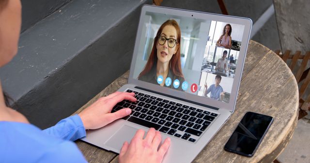 Woman Participating in Video Conference on Laptop - Download Free Stock Images Pikwizard.com