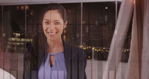 Asian Businesswoman Analyzing Financial Data in Office Setting