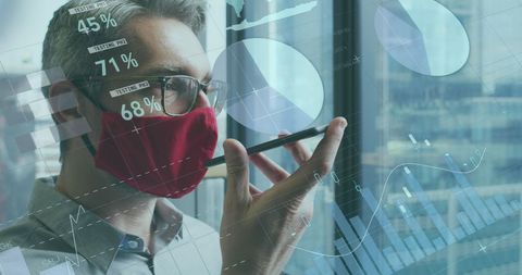 Man Wearing Face Mask Analyzing Data on Smartphone with Futuristic Interface - Download Free Stock Images Pikwizard.com