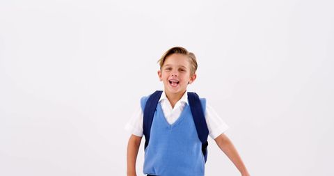 Excited schoolboy ready for a new school year