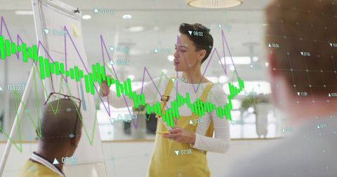 Businesswoman Leading Office Meeting with Data Visualization Overlay