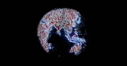 Digital Data Overload on Spinning Globe Amidst Darkness