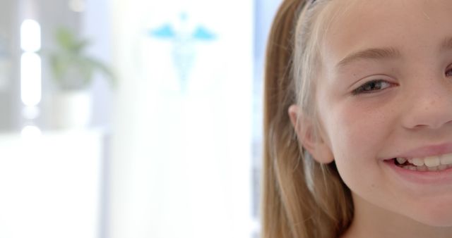 Smiling Young Girl During Medical Appointment - Download Free Stock Images Pikwizard.com