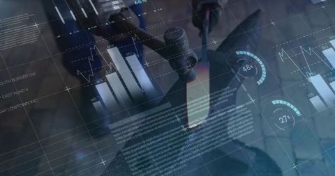 Scientist using microscope with data charts superimposed for precision research