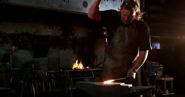 Blacksmith Forging Metal in Workshop with Fire - Download Free Stock Images Pikwizard.com