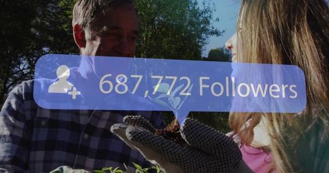 Grandfather and Granddaughter Gardening Highlighting Sustainable Practices