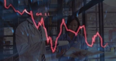 Medical Team Analyzing Healthcare Data with Declining Graph