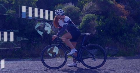 Cyclist Harnessing Outdoor Fitness Technology in Nature