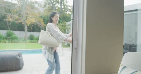 Happy Daughter Arriving at Doorway for Family Reunion - Download Free Stock Images Pikwizard.com