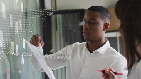 Business Team Analyzing Data by Transparent Board