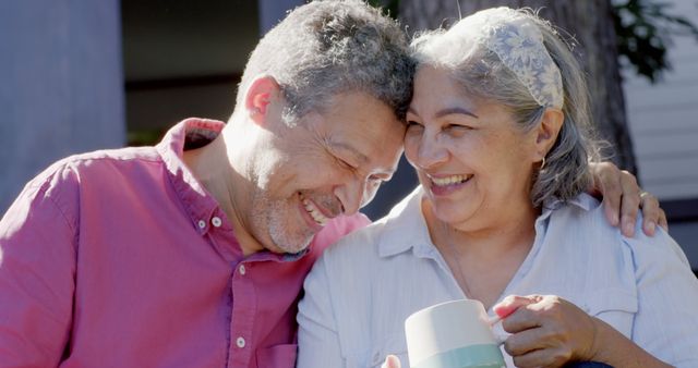 Happy Senior Couple Relaxing and Laughing Outdoors - Download Free Stock Images Pikwizard.com