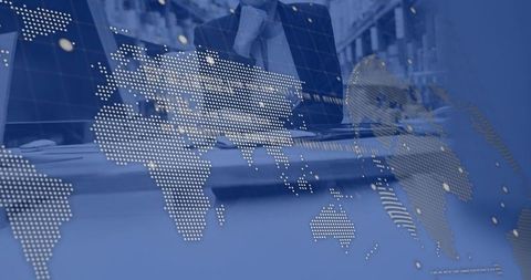 Businesswoman in Control Center with Global Map Overlay