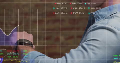 Businessman Analyzing Data on Smartwatch with Financial Graphs