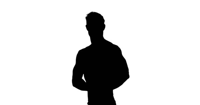 Silhouette of Muscular Man Standing Against White Background - Download Free Stock Images Pikwizard.com