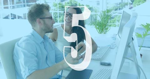 Colleagues Collaborating at Desk with Transparent Number Overlay