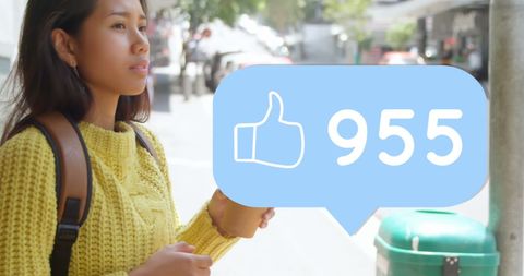 Woman engaging with social media interaction outdoors