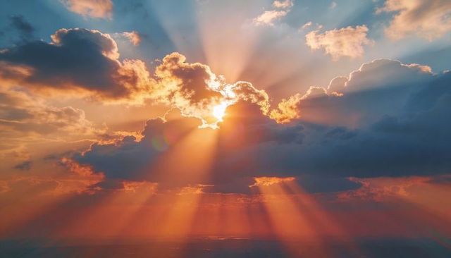 Golden Sunburst Breaking Through Clouds with Dramatic Crepuscular Rays over Horizon