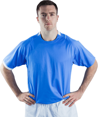 Transparent portrait of serious rugby player with hands on hips