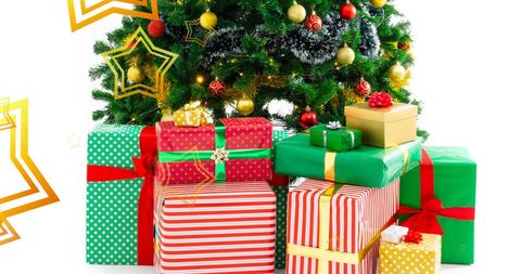 Colorful Christmas Gifts Under Vibrant Tree with Stars - Download Free Stock Images Pikwizard.com