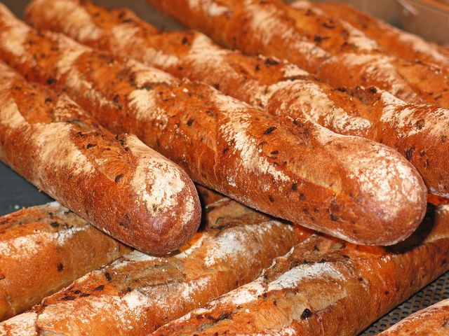 Freshly Baked Crunchy French Baguettes Close-up - Download Free Stock Photos Pikwizard.com