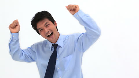 Joyful Man in Business Attire Dancing Enthusiastically