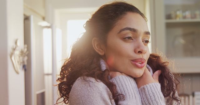 Young Woman Feeling Cozy in Morning Sunlight - Download Free Stock Images Pikwizard.com