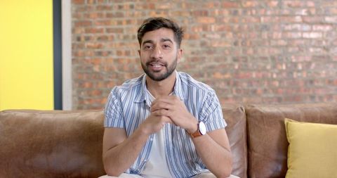 Businessman Discussing Ideas in Modern Office Lounge