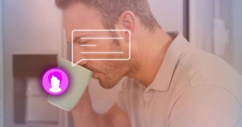 Man enjoys morning coffee with digital communication interface