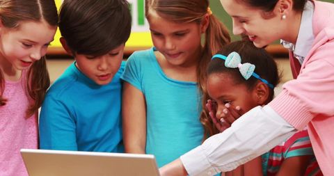 Diverse Schoolchildren Engaged in Classroom Technology Activity - Download Free Stock Images Pikwizard.com