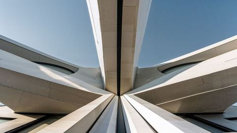 Modern architectural structure with radiating concrete beams